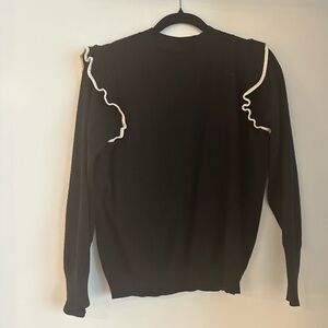 Amazon brand black sweater with shoulder ruffle detail